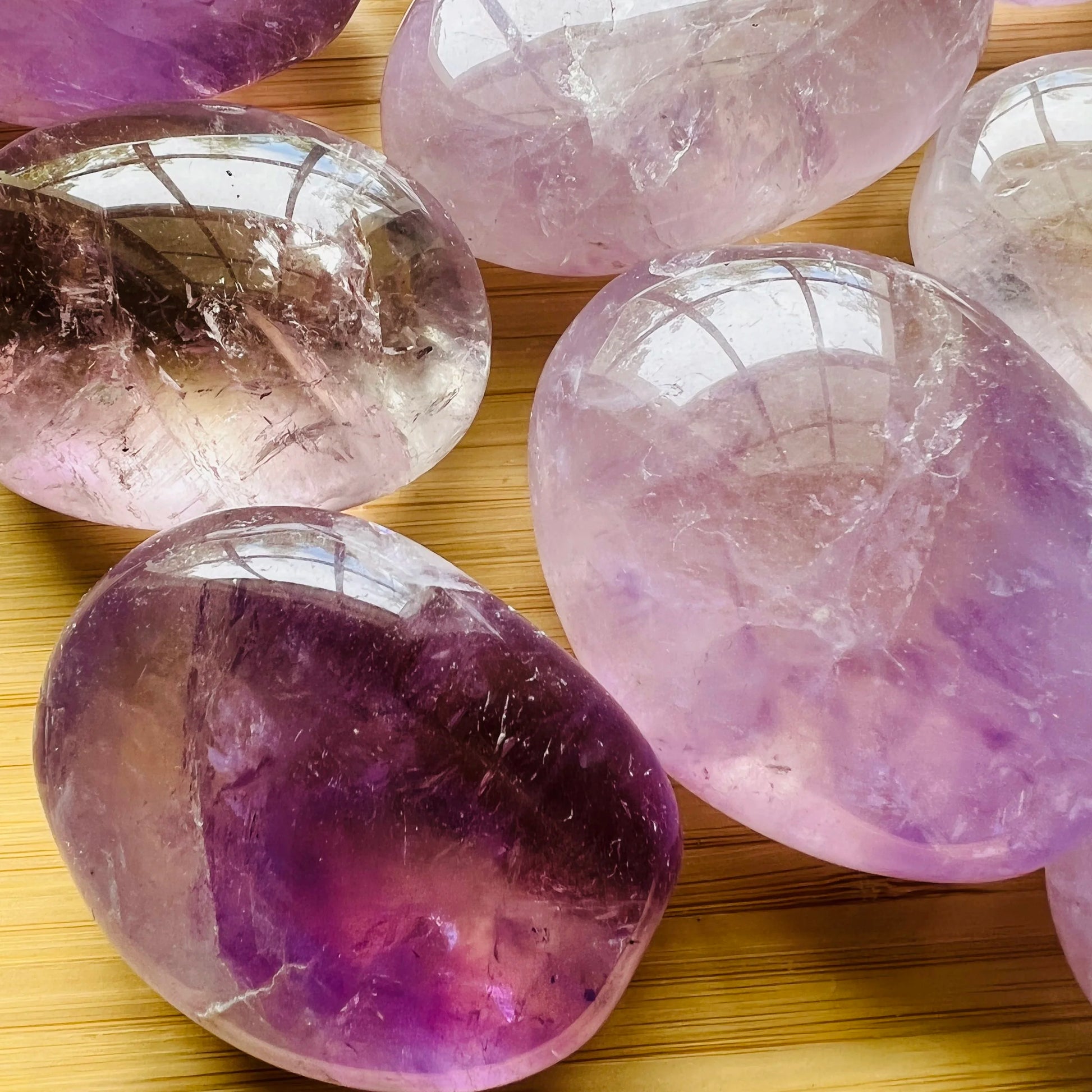 Bottom side of Amethyst palm stone, showing natural sheen.