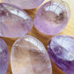 Top-side view of Amethyst palm stone, showing translucent edges.