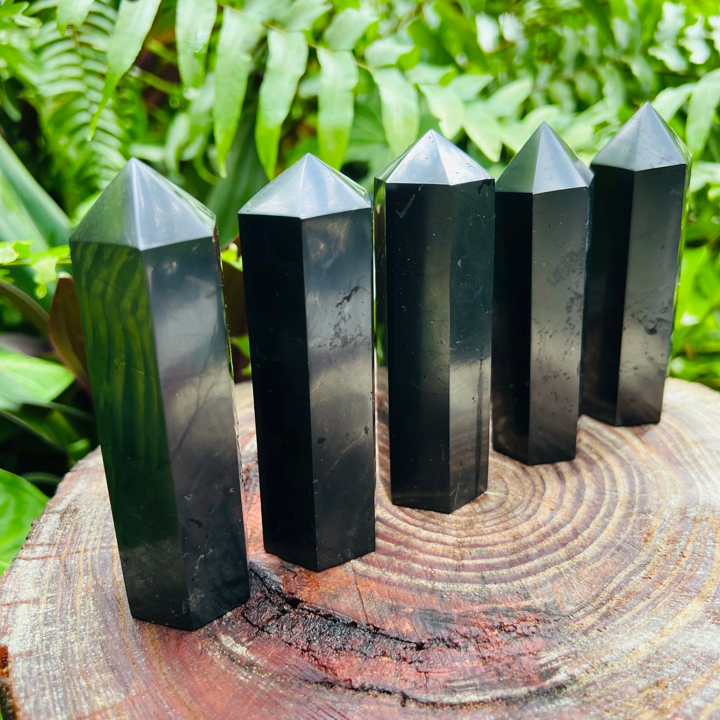 Alternate side of Shungite polished point, showing characteristic patterning, linked to Protection.