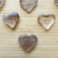 Sideways view of Smoky Quartz polished heart, from Minas Gerais, Brazil.