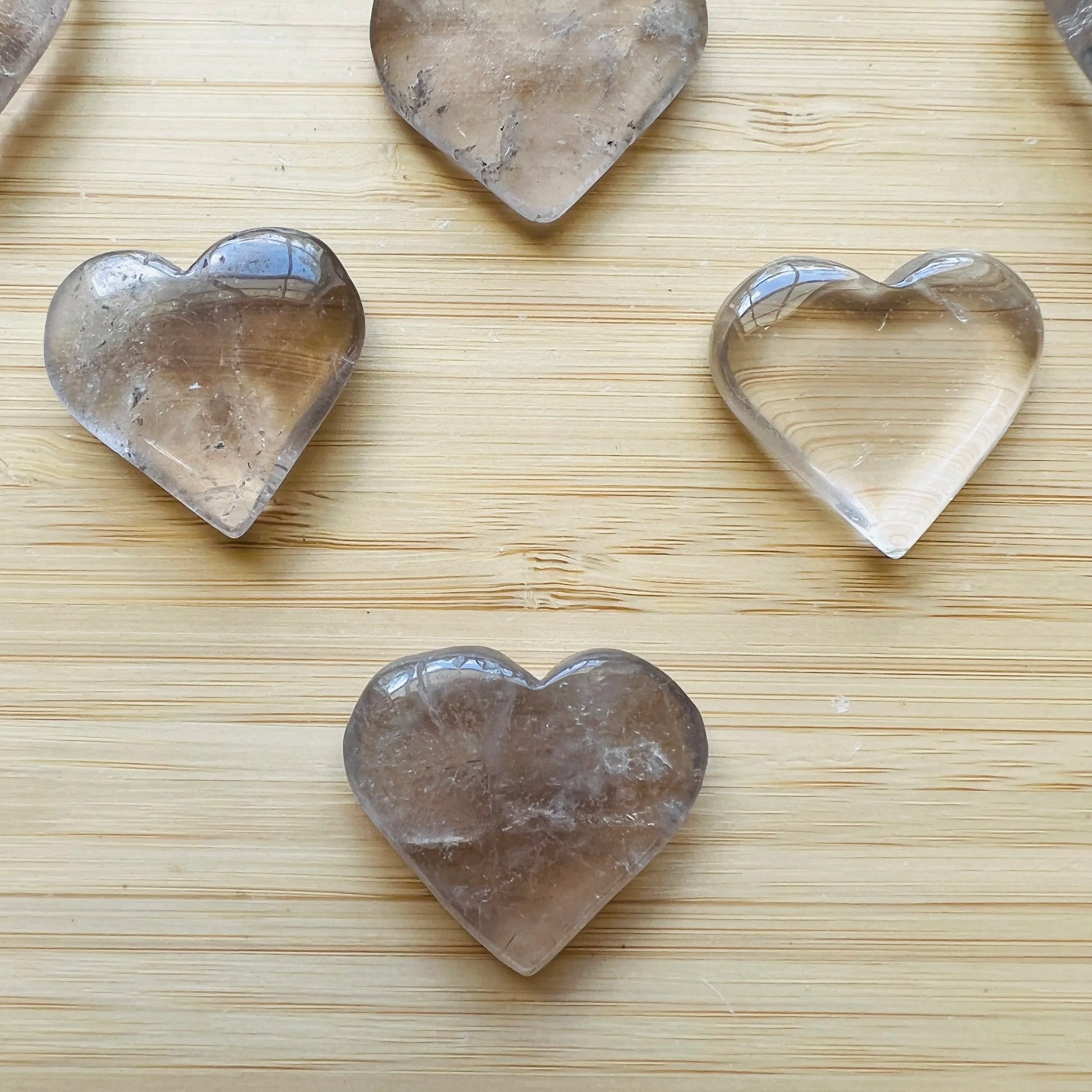 Sideways view of Smoky Quartz polished heart, from Minas Gerais, Brazil.