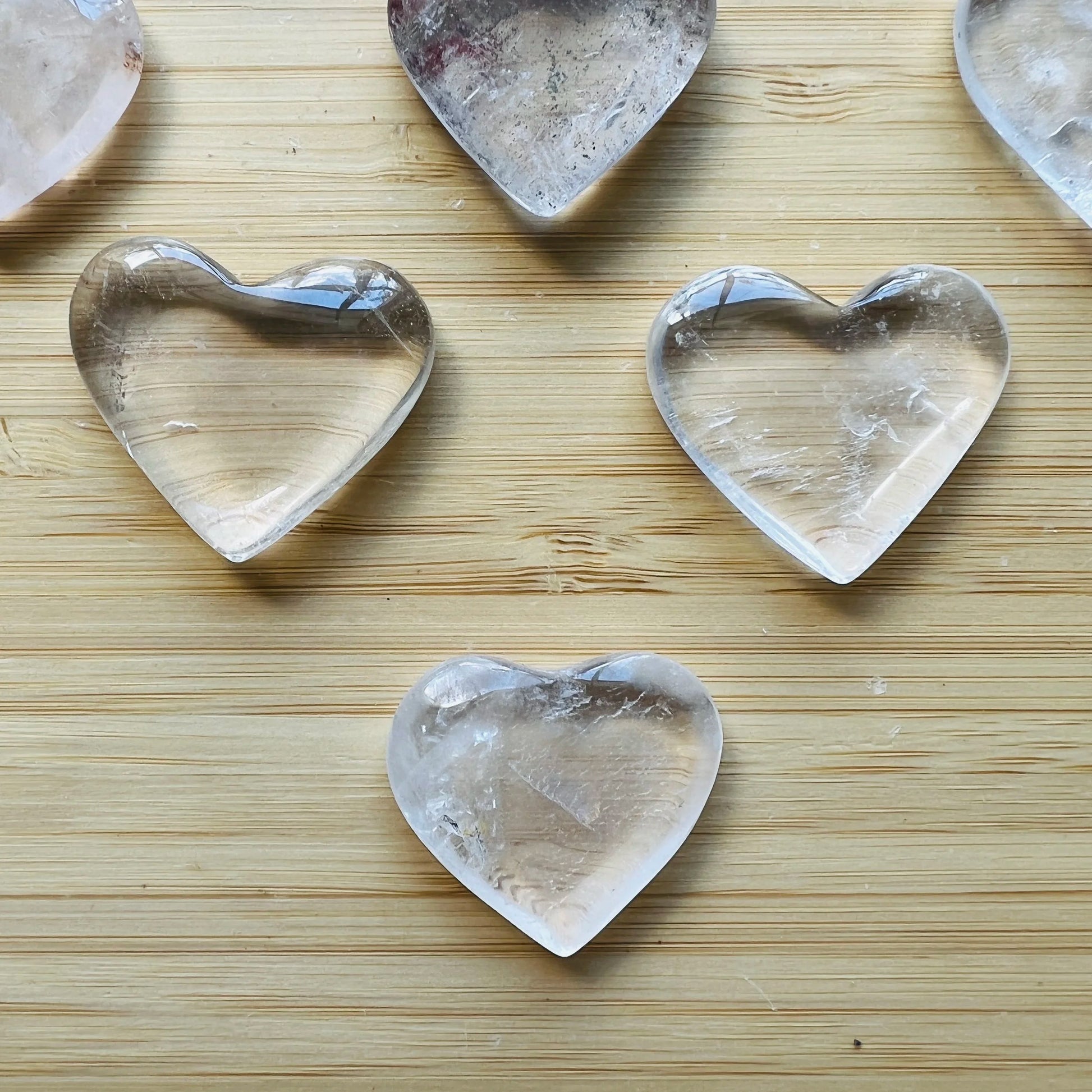 Side profile of Clear Quartz polished heart, linked to Cleansing and Meditation.