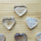 Alternate side of Clear Quartz polished heart, showing natural variation, from Minas Gerais, Brazil.