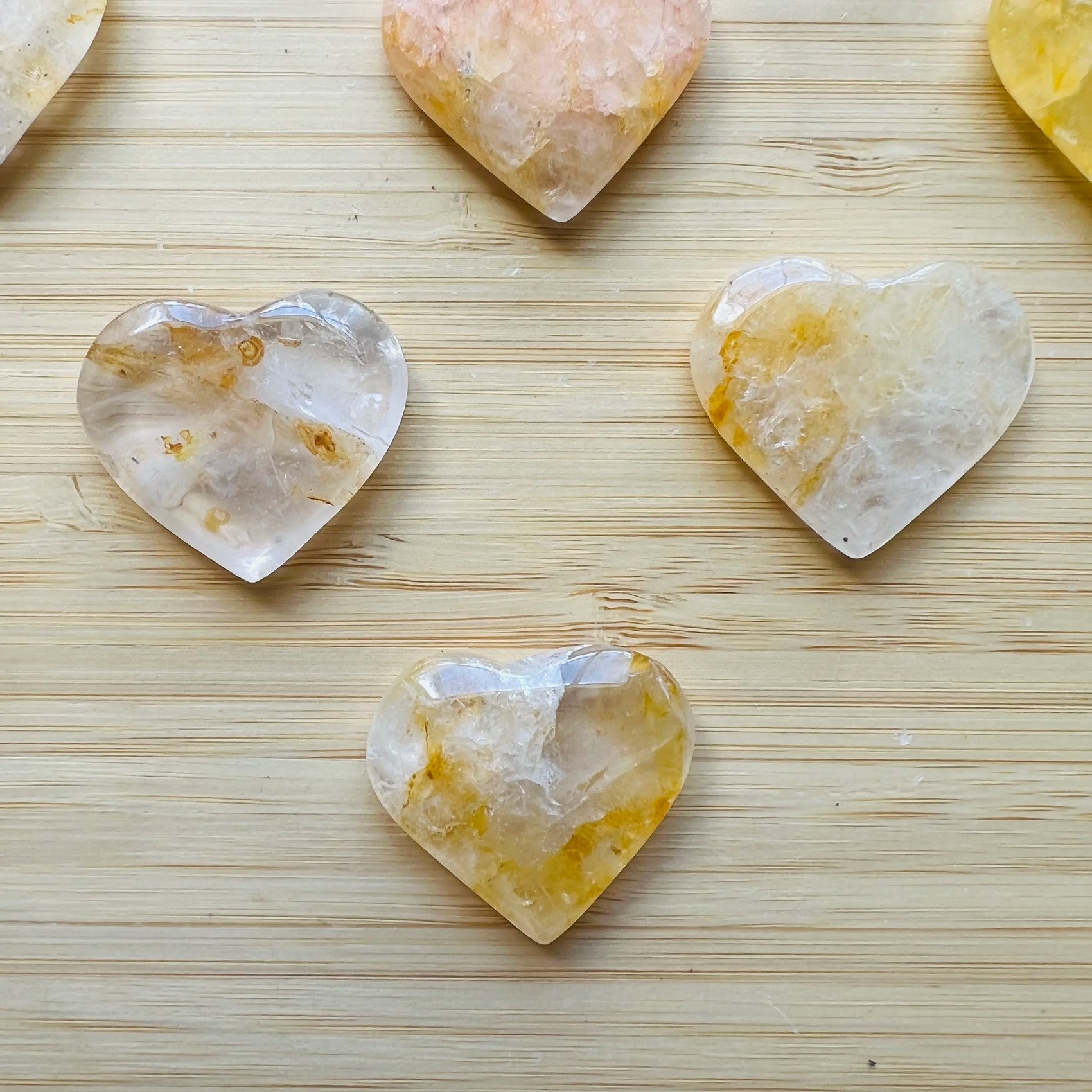 Aerial view of Golden Healer polished heart, Brazil-sourced, showing matte finish.