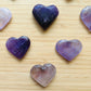 Overhead view of Amethyst polished heart, showing glassy finish, kept near for Stress Relief and Sleep.