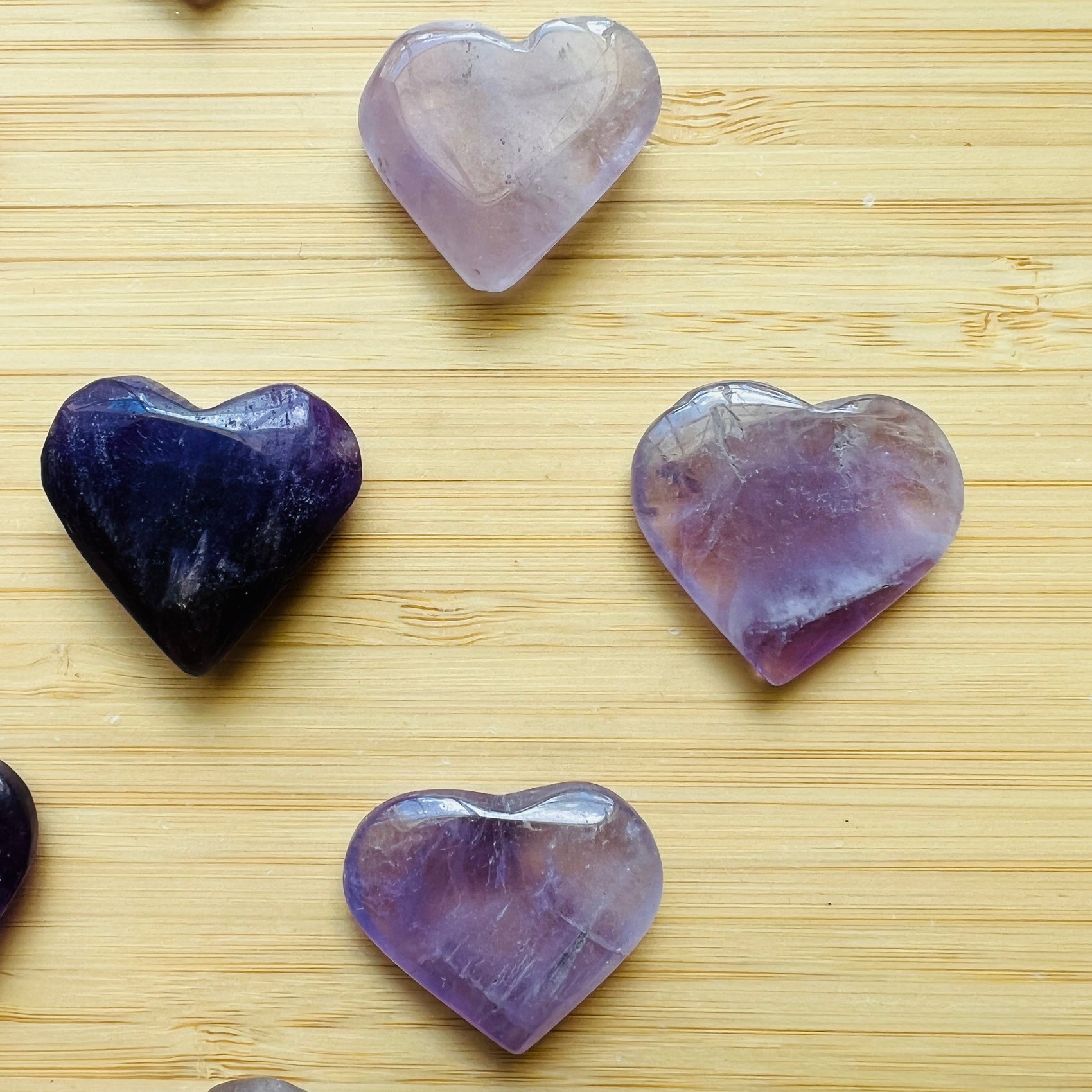 Hand-scale view of Amethyst stone, from Rio Grande do Sul, Brazil, shown for size reference.