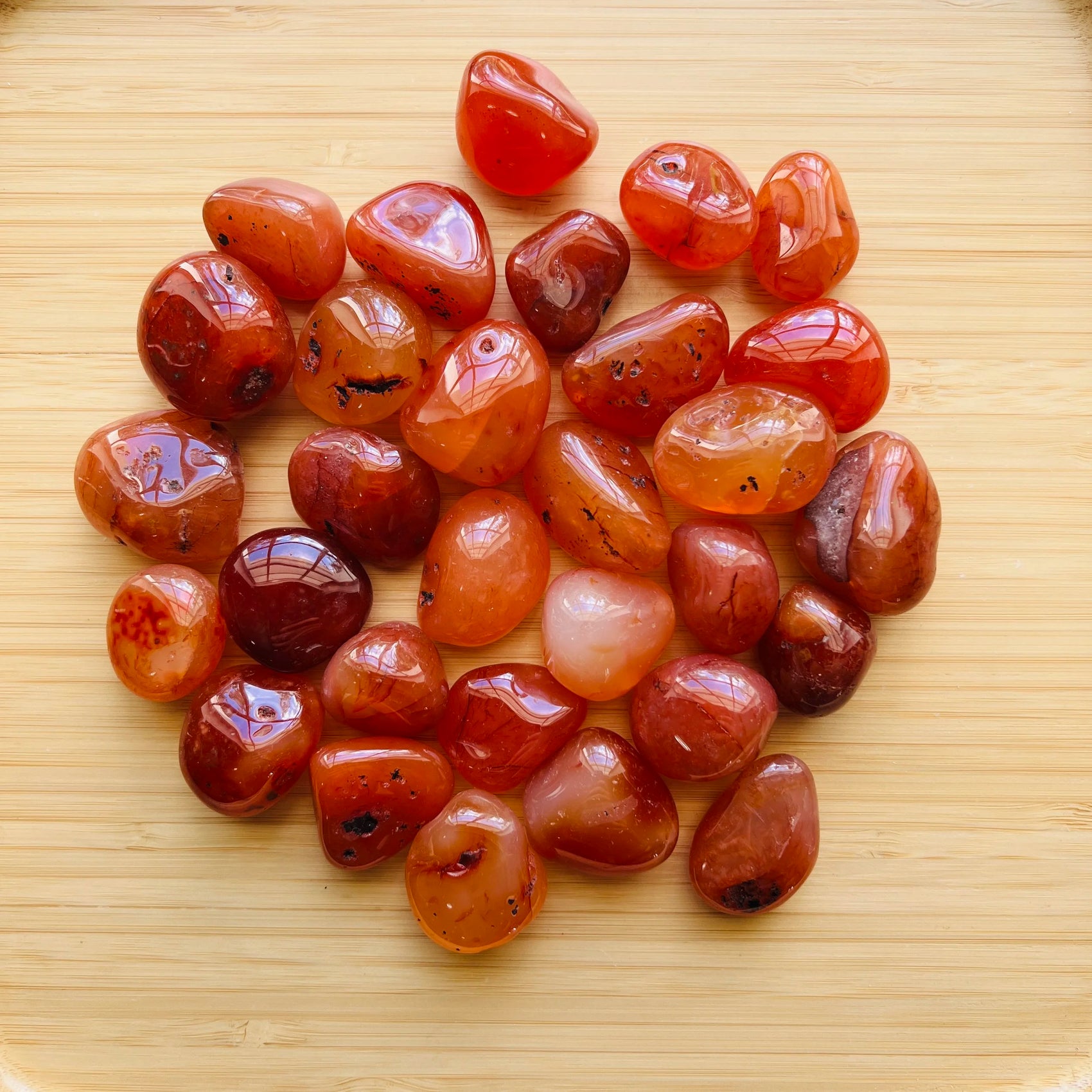 Carnelian tumbled stone in Orange, Red tones, ethically sourced from Brazil for Confidence and Creativity