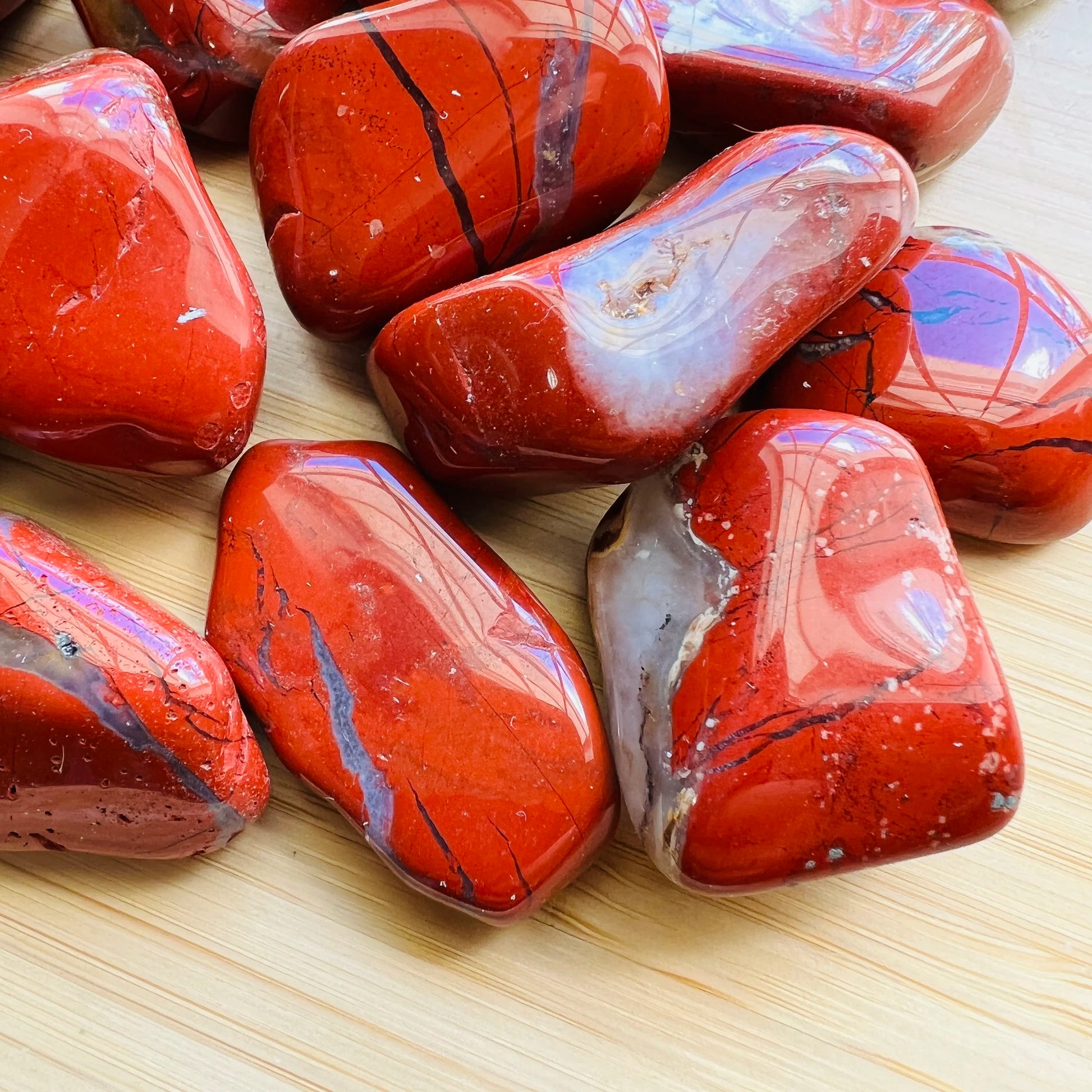 Handheld Red Jasper tumbled stone from South Africa for meditation, Confidence and Protection