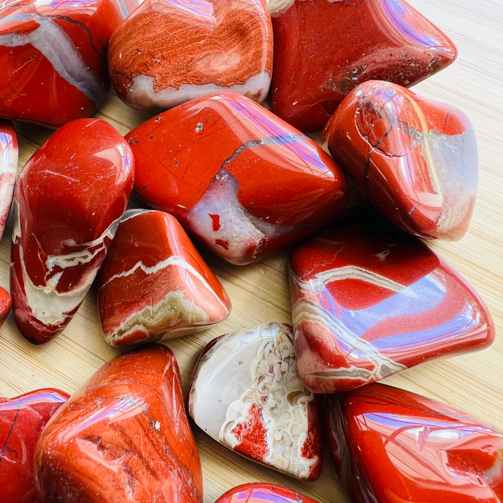 Full profile of Grade AA Red Jasper tumbled stone ready to ship from Beyond Bohemian