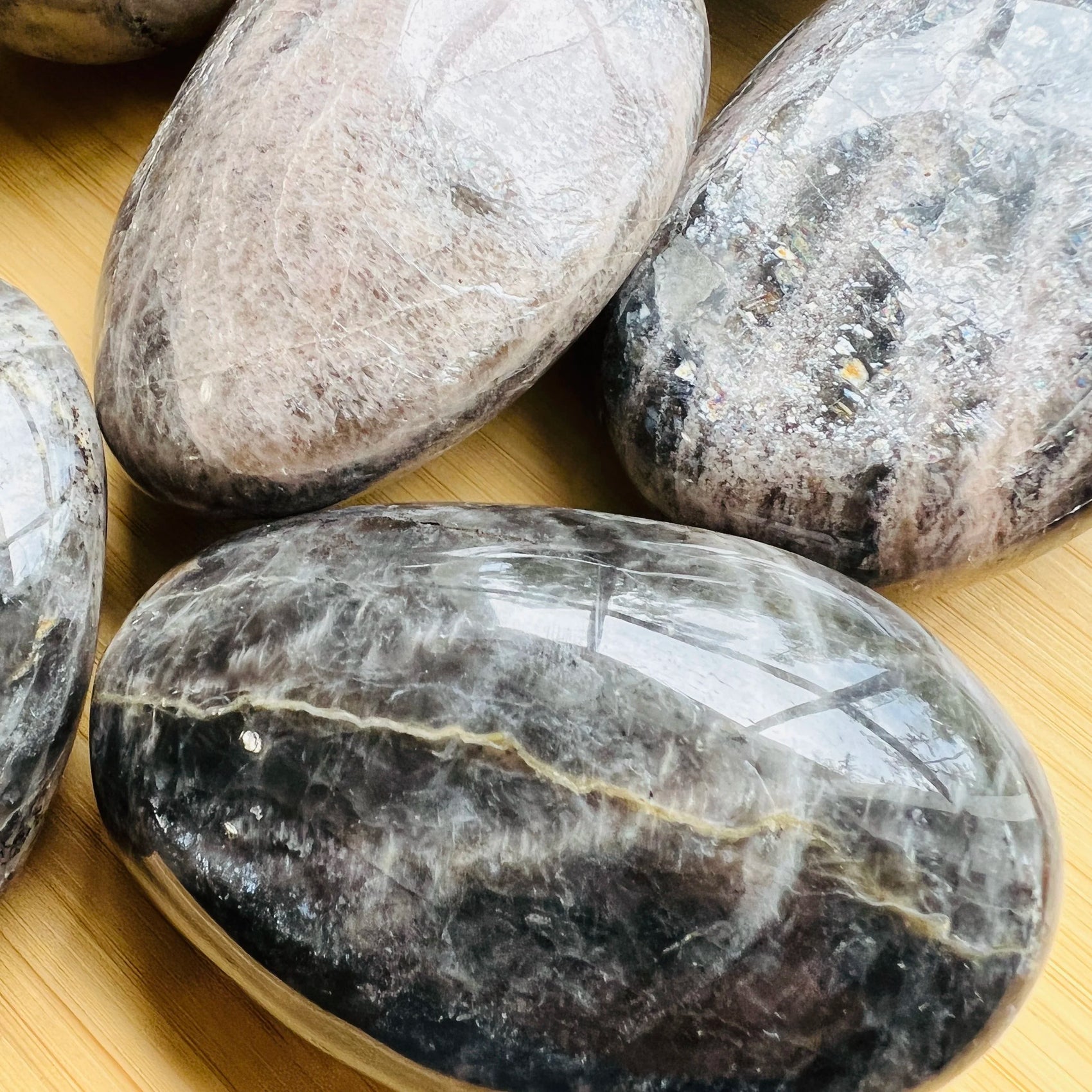 Handheld Black Moonstone palm stone from Madagascar for meditation, Intuition and Protection