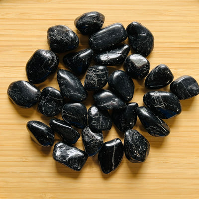 Ethically sourced Grade AA Black Tourmaline tumbled stone from Minas Gerais, Brazil at Beyond Bohemian
