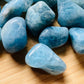 Full profile of Grade AAA Aquamarine tumbled stone ready to ship from Beyond Bohemian