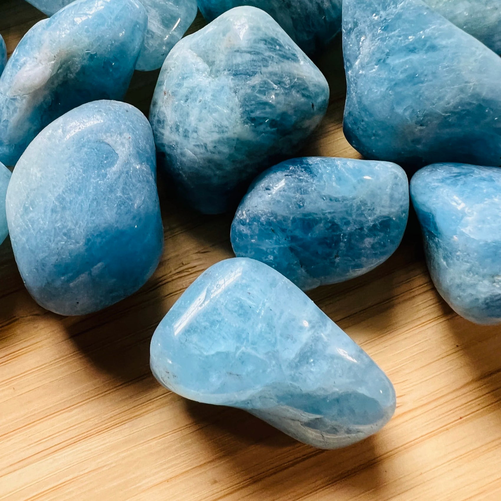 Full profile of Grade AAA Aquamarine tumbled stone ready to ship from Beyond Bohemian