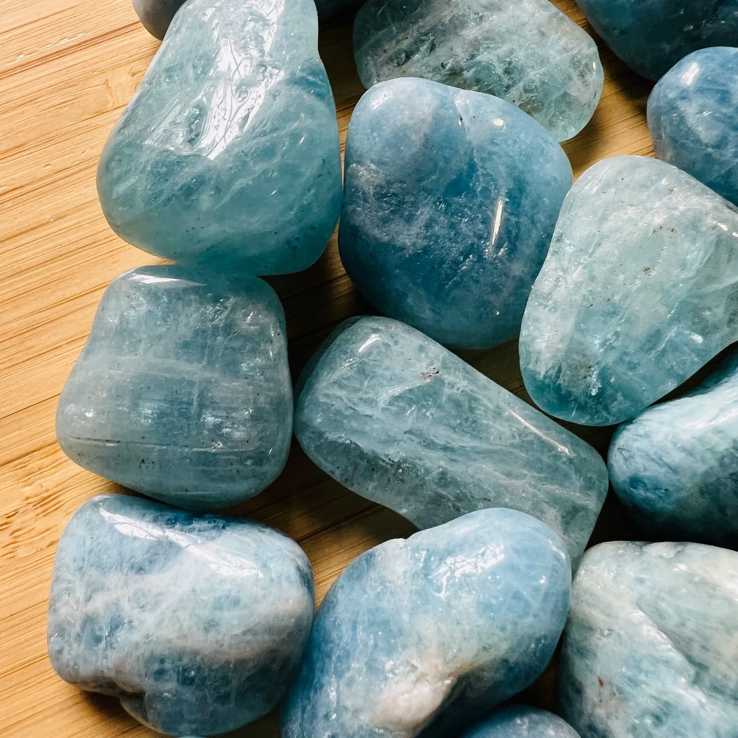 Full profile of Grade AAA Aquamarine tumbled stone ready to ship from Beyond Bohemian