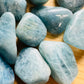 Full profile of Grade AAA Aquamarine tumbled stone ready to ship from Beyond Bohemian