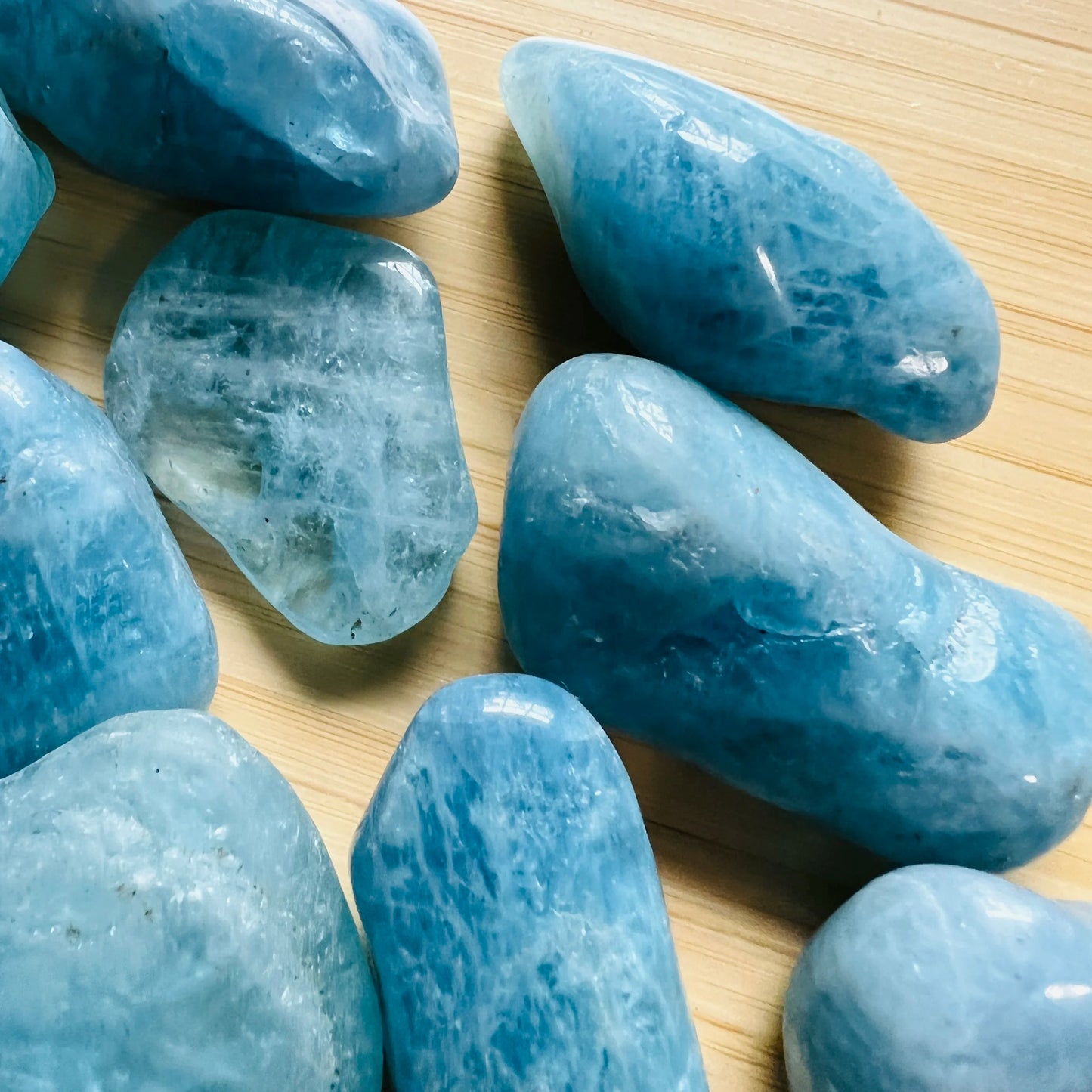 Full profile of Grade AAA Aquamarine tumbled stone ready to ship from Beyond Bohemian