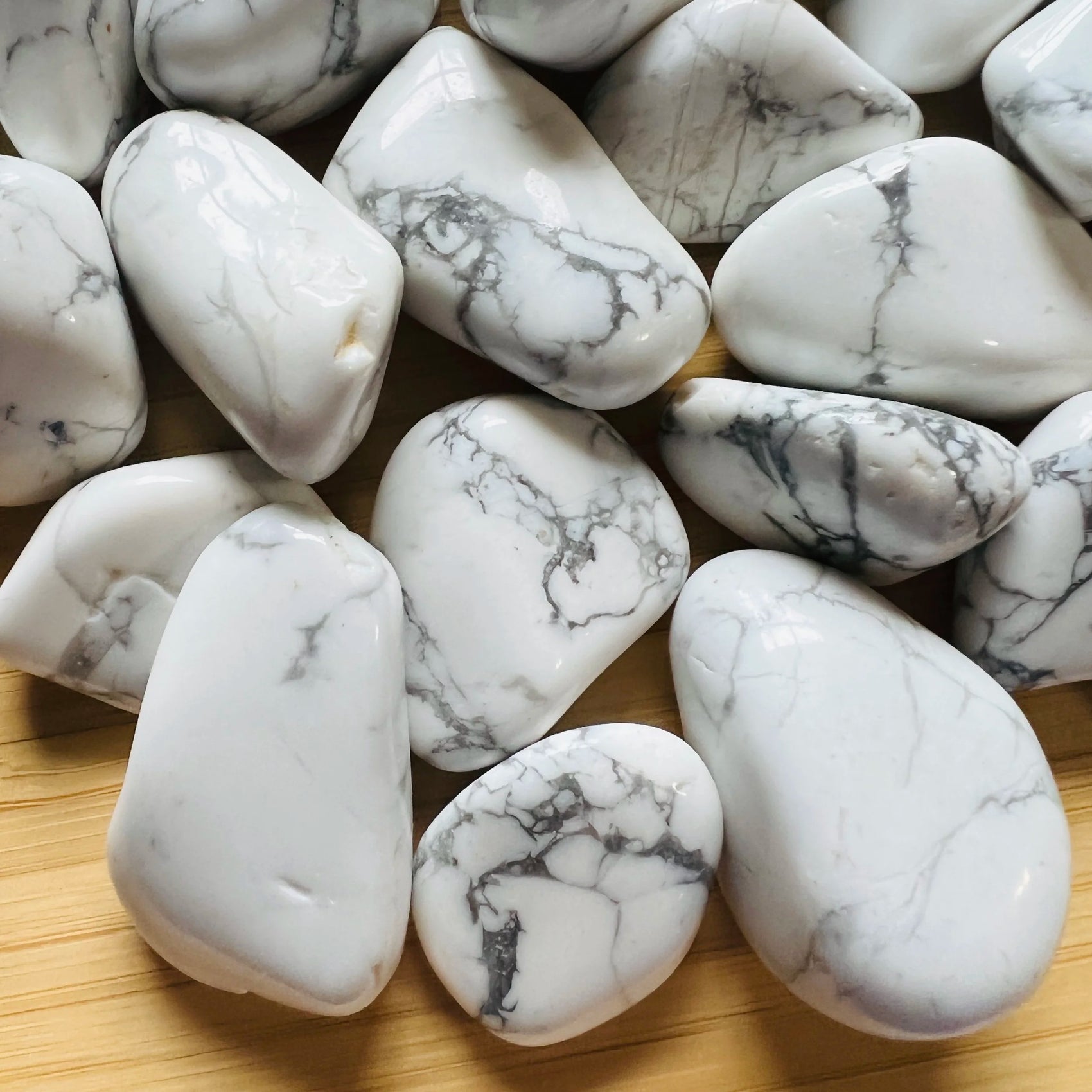 Back view of Grade AA Howlite tumbled stone showing natural surface