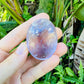 Back view of Grade AA Amethyst palm stone showing natural surface