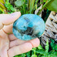 Palm-scale view of one Amazonite palm stone for scale, sourced from Madagascar.