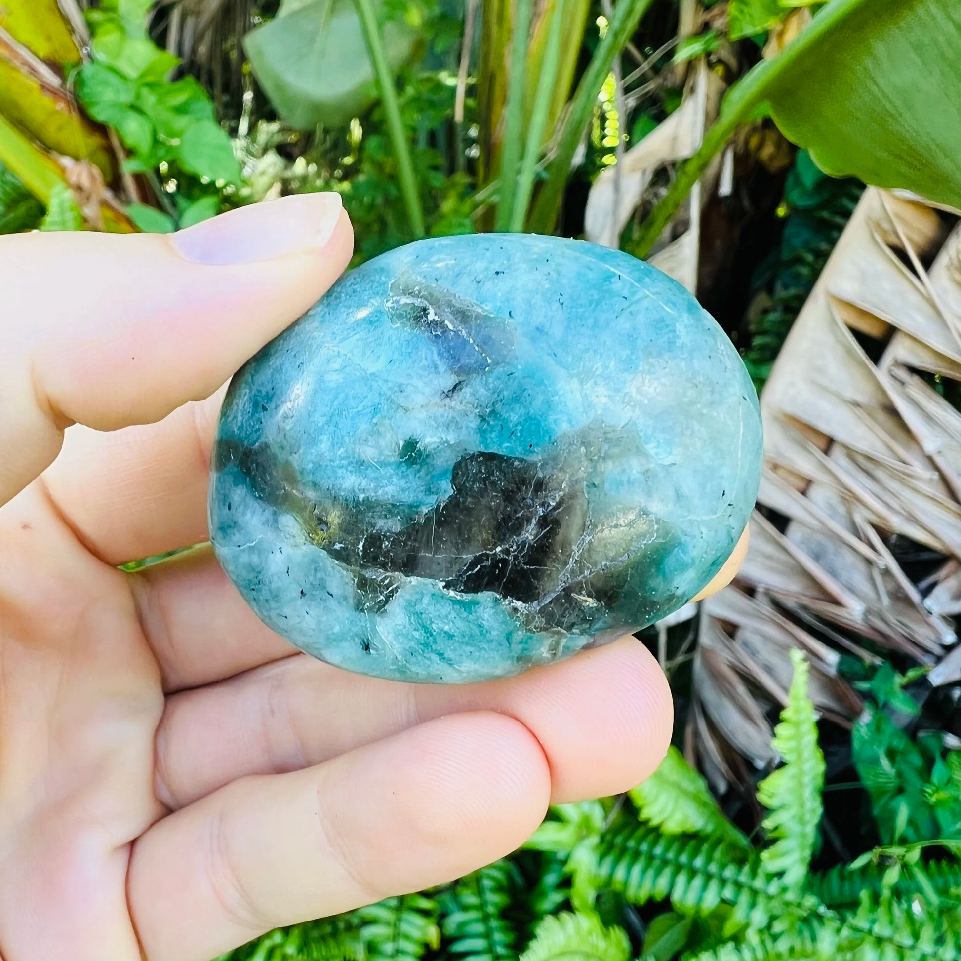 Palm-scale view of one Amazonite palm stone for scale, sourced from Madagascar.