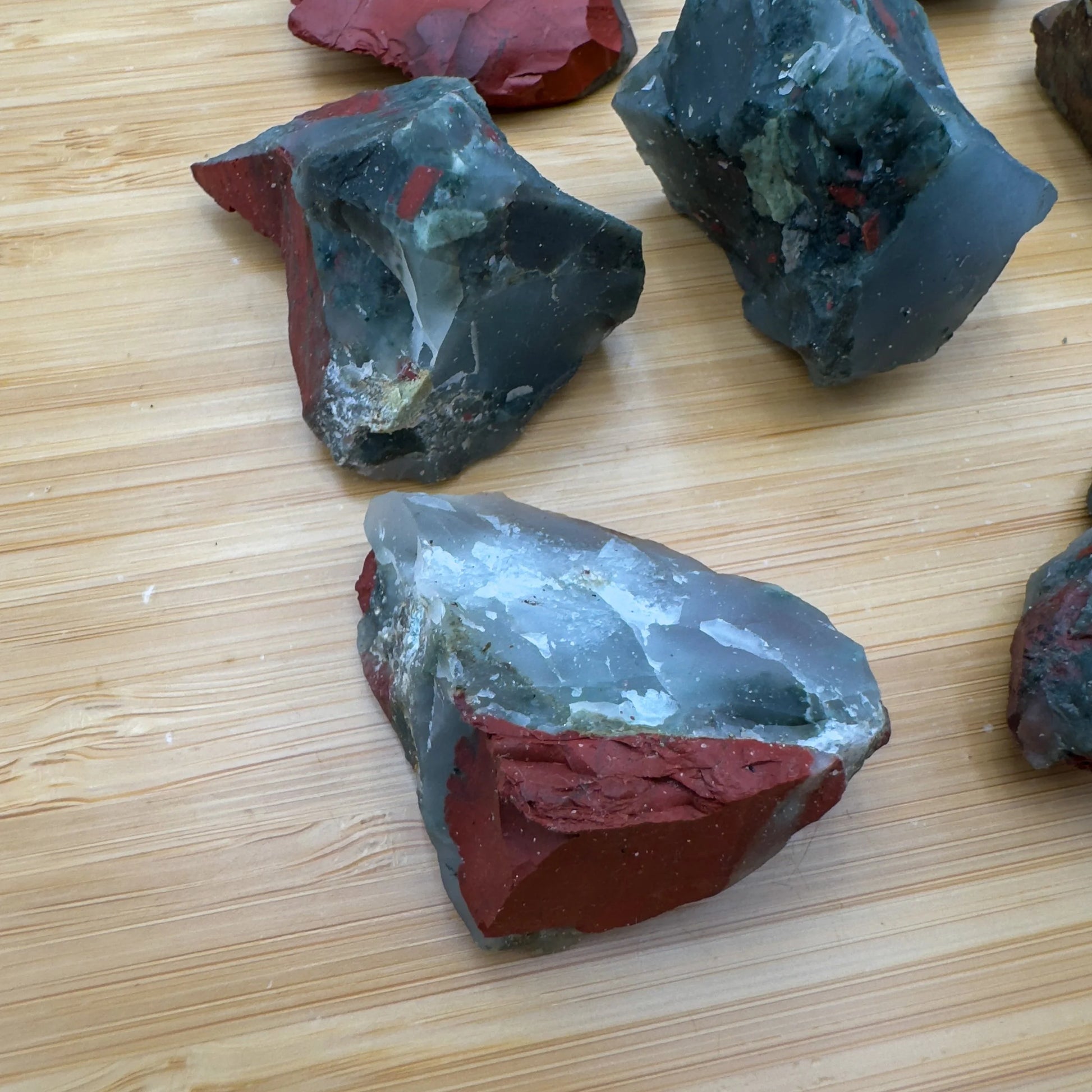 Plan view of Bloodstone raw stone, turned to for Energy and Protection, showing untreated character.