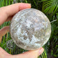 Back view of Grade AA Ocean Jasper sphere showing natural surface