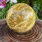 Detail shot of Grade AA Ocean Jasper sphere under natural light
