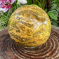 Back view of Grade AA Ocean Jasper sphere showing natural surface