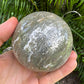 Detail shot of Grade AA Ocean Jasper sphere under natural light