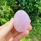 Aerial view of Rose Quartz palm stone, hand-selected from Alaotra-Mangoro, Madagascar, showing natural sheen.