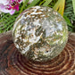 Alternate side of Ocean Jasper polished sphere, showing natural texture, drawn on for Emotional Healing and Stress Relief.