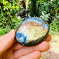 Back view of Labradorite palm stone, from Madagascar.