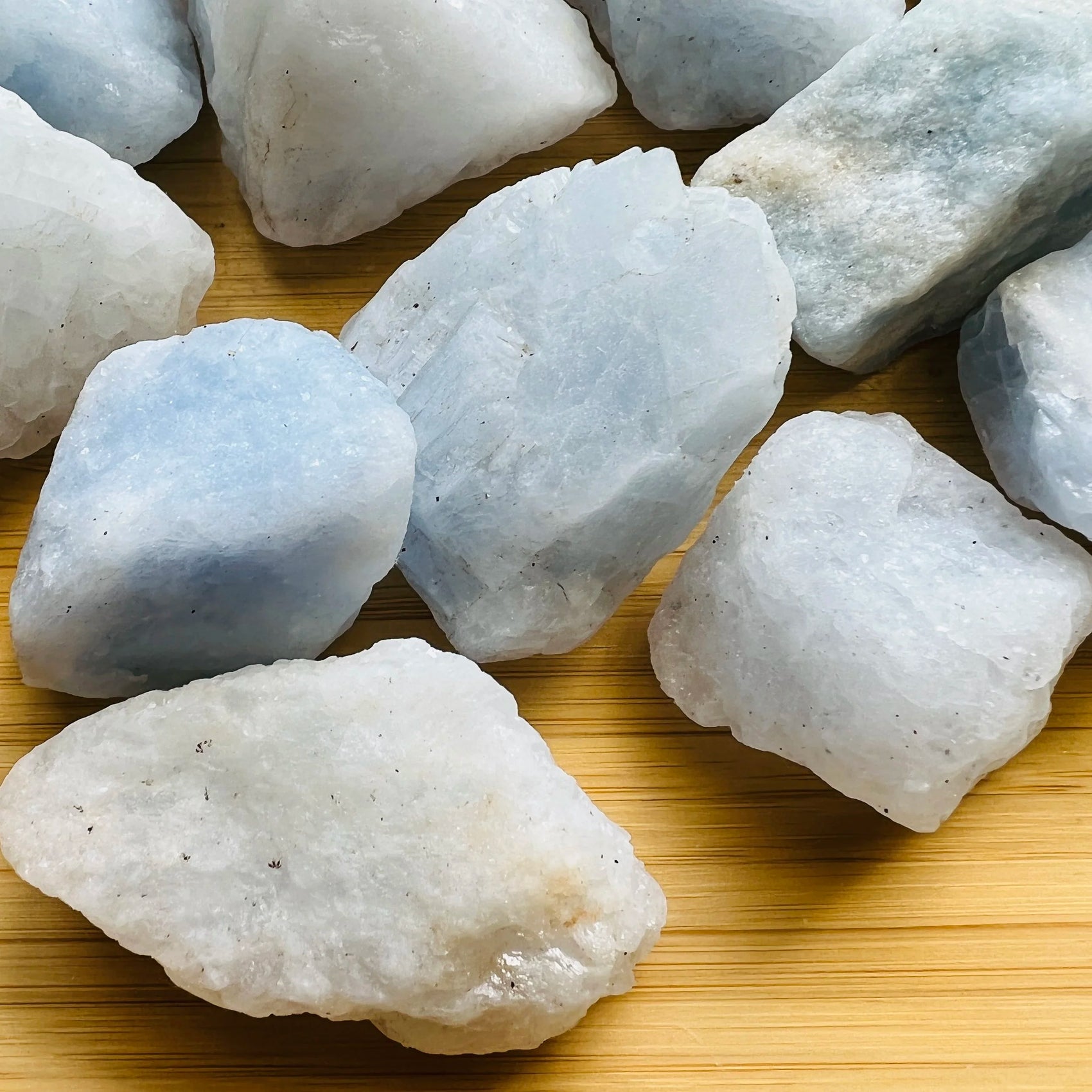 Natural surface of Grade A Blue Calcite raw stone, showing natural banding.