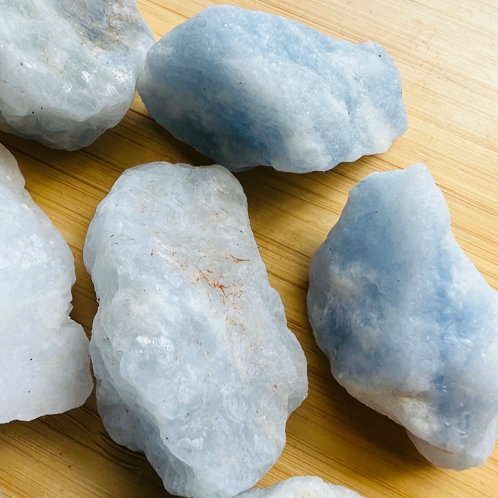 Reverse angle of Blue Calcite raw stone, often kept for Stress Relief and Emotional Healing, Madagascar-sourced.