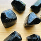Back view of Grade A Black Tourmaline raw showing natural surface