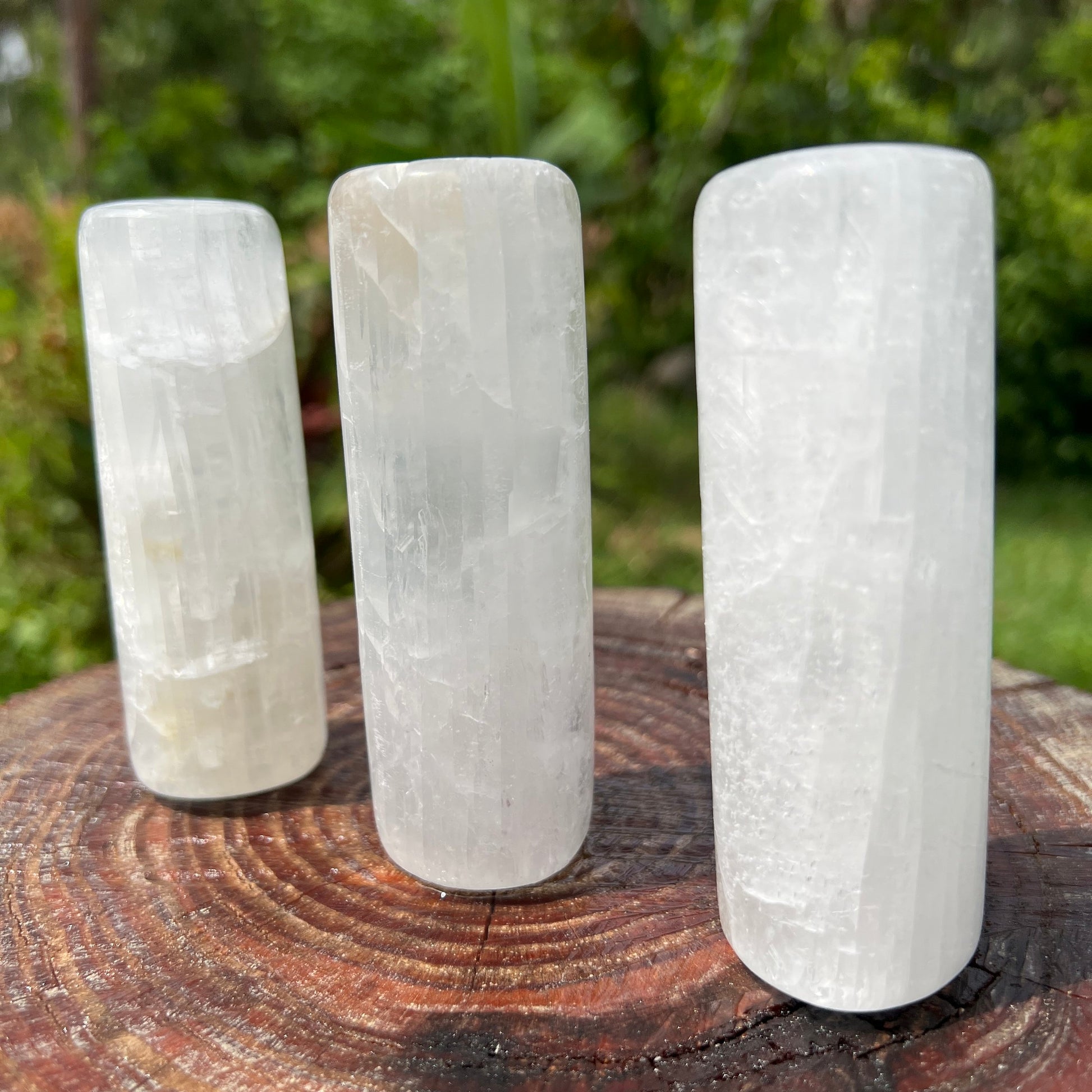 Side perspective of Grade AAA Selenite polished cylinder, sourced from New Mexico, USA.