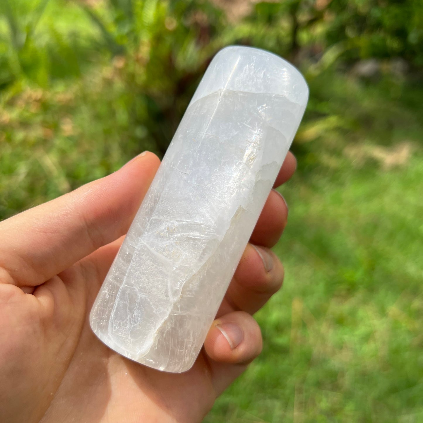 Top angle of Selenite polished cylinder, showing matte finish, from United States.