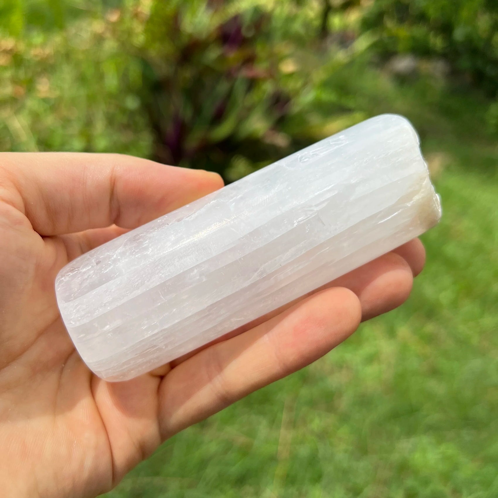 Lifestyle context of Selenite stone, associated with Cleansing, showing natural surface character.