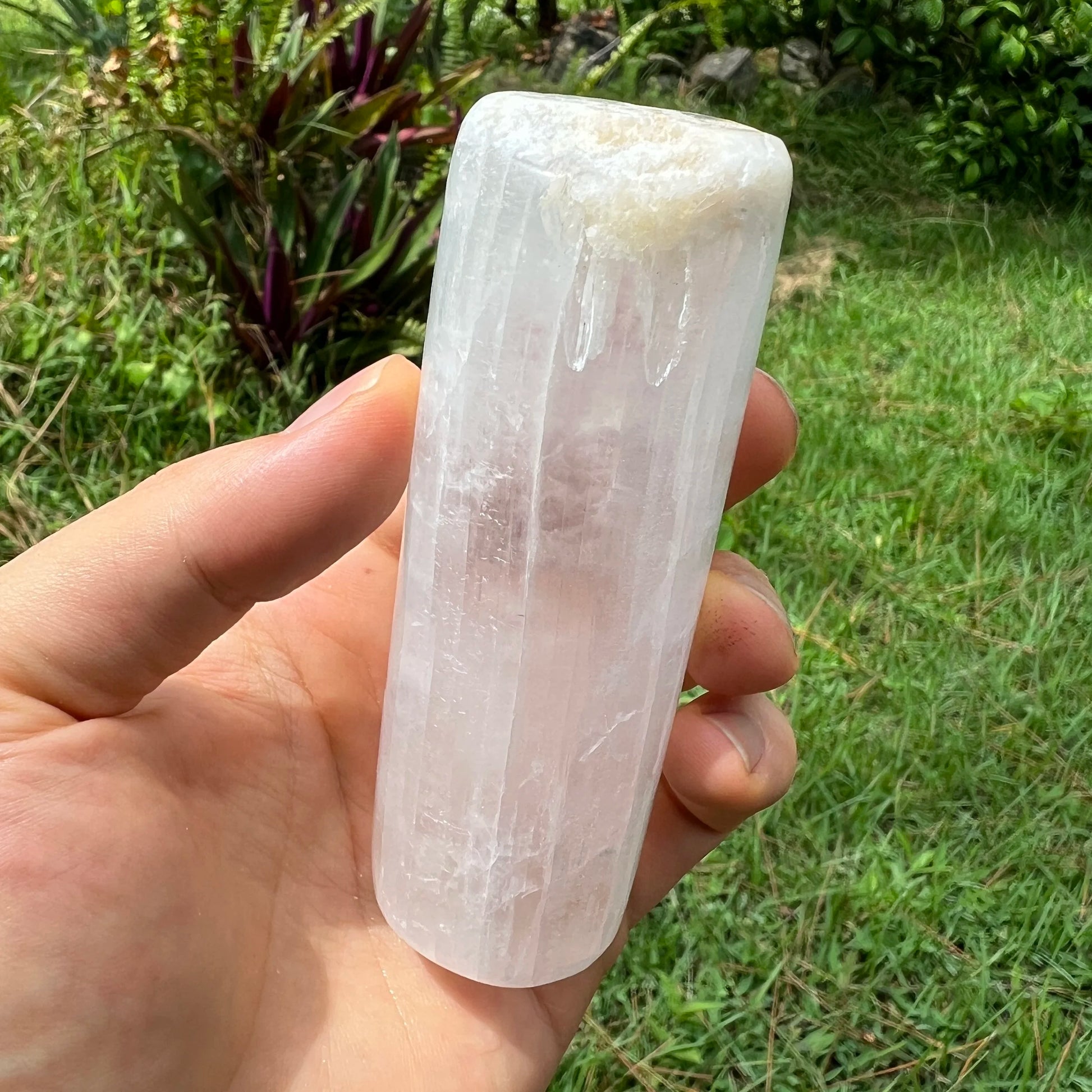 Back view of Grade AAA Selenite polished crystals & decor showing natural surface