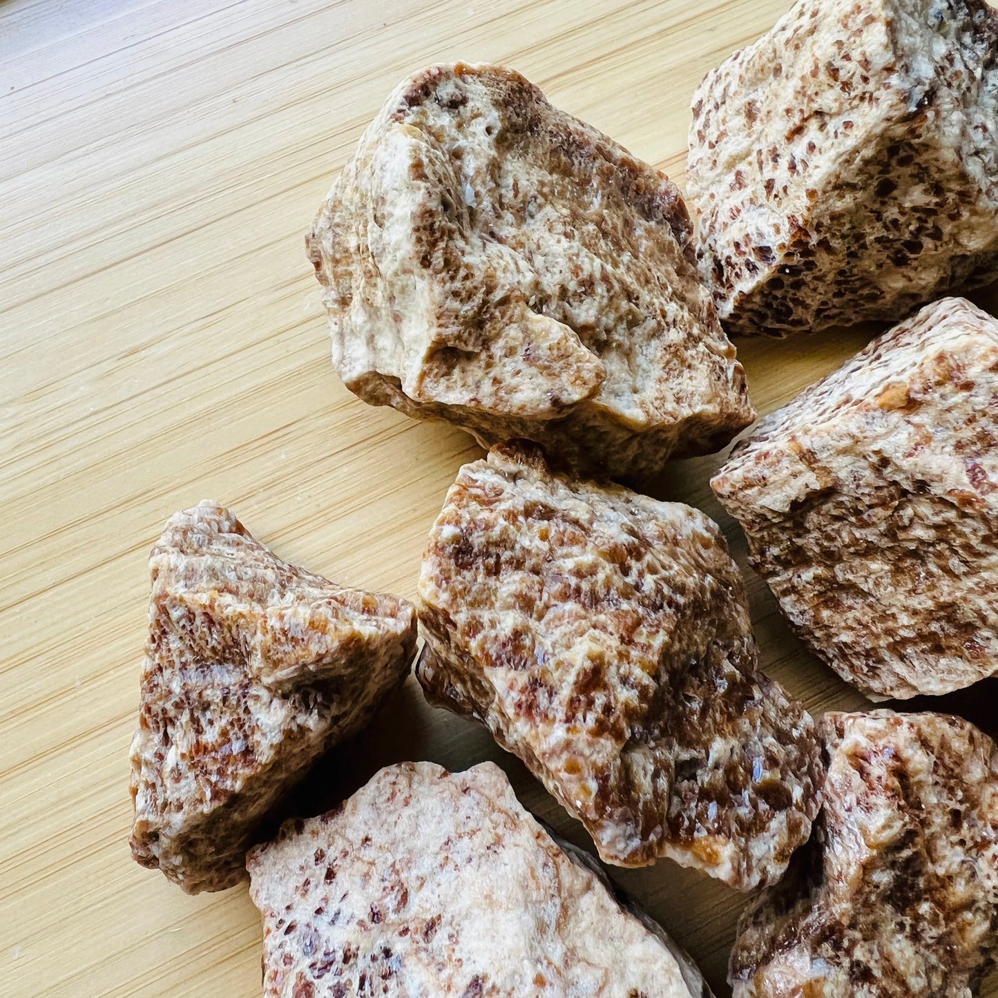 Reverse side of Brown Aragonite raw stone, Peru-sourced, showing honest grain.