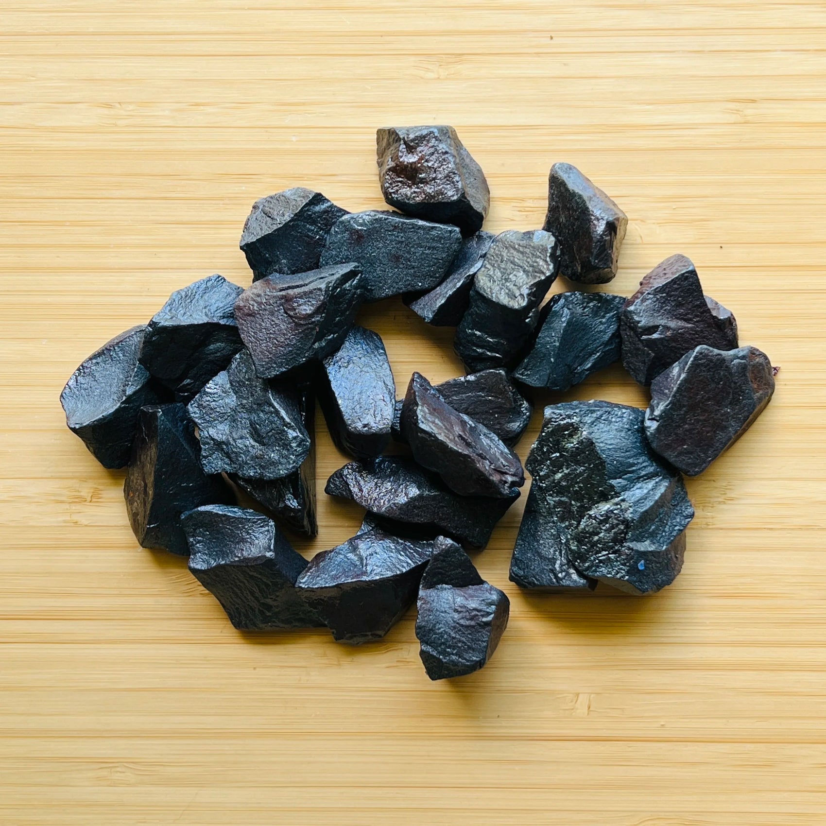 Surface detail of Hematite raw stone, showing raw matrix, Brazil-sourced.
