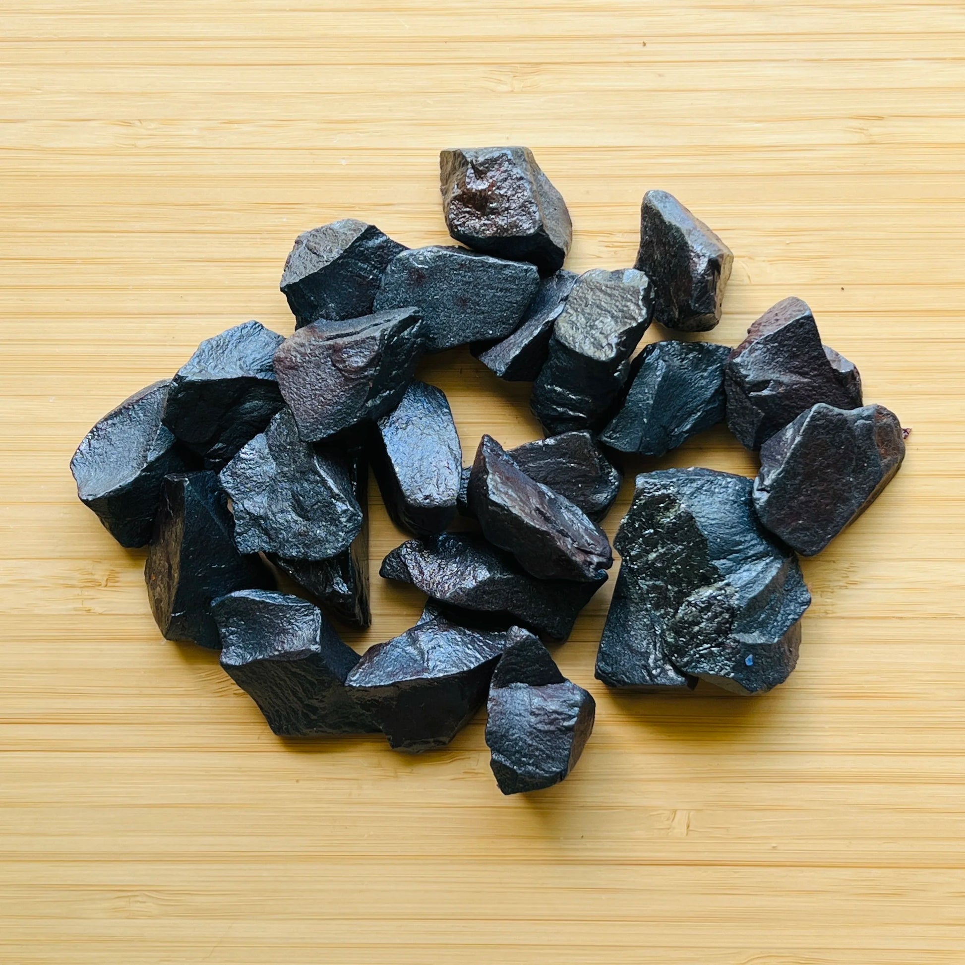 Surface detail of Hematite raw stone, showing raw matrix, Brazil-sourced.