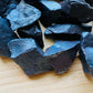 Overhead angle of Hematite raw stone, Brazil-sourced, linked to Grounding.