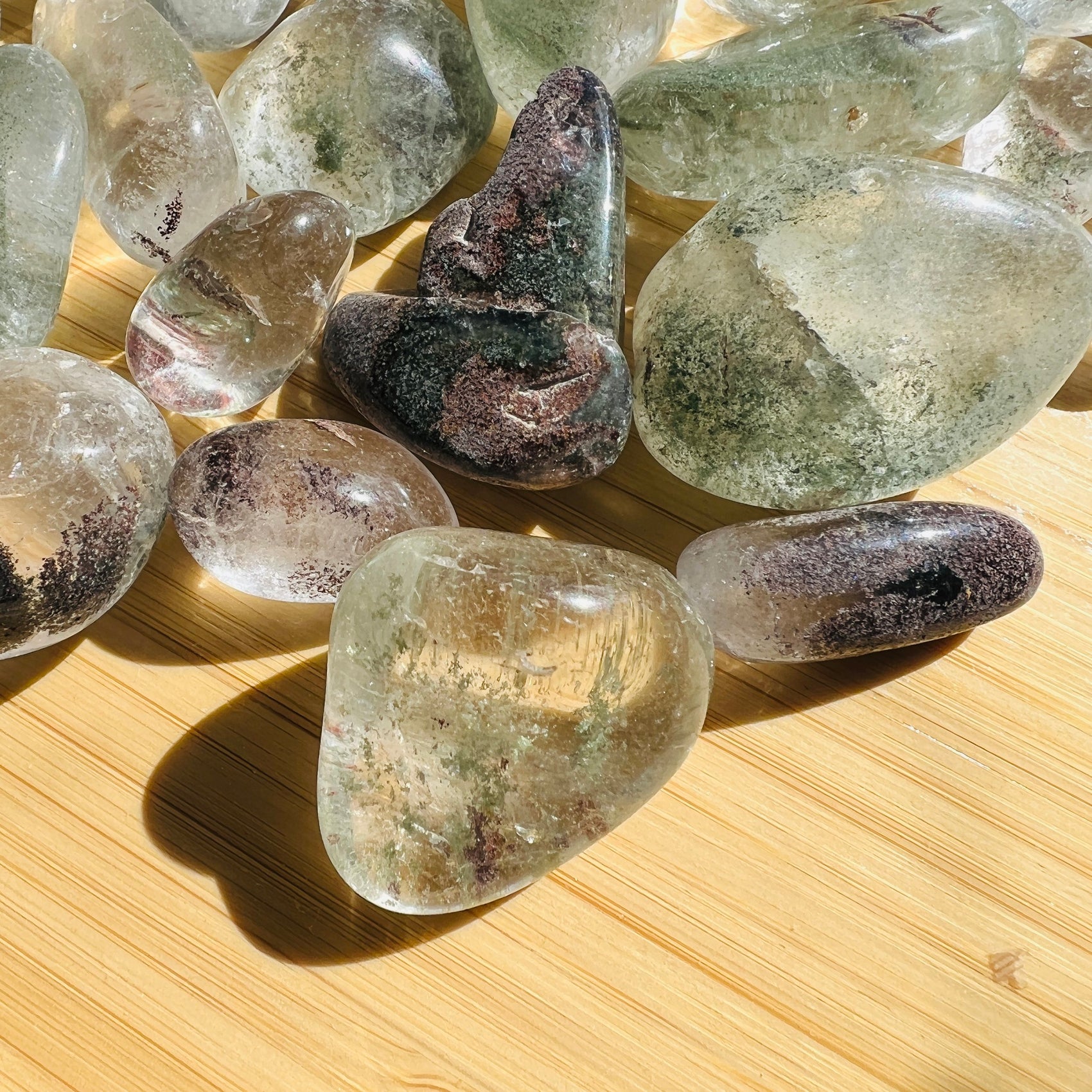 Looking down on Lodolite tumbled stone, hand-selected from Brazil, for Dreaming and Manifestation.