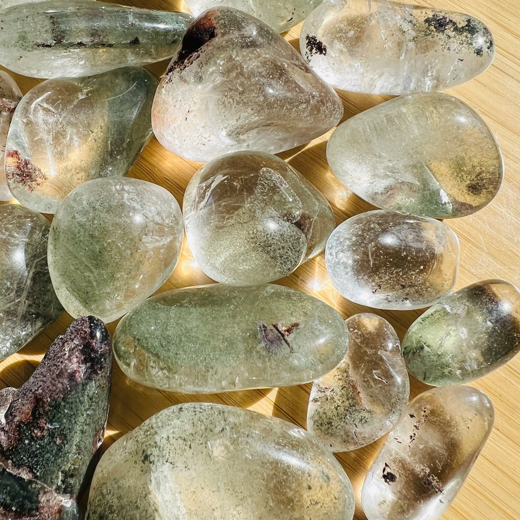 Close detail of Lodolite tumbled stone, sourced from Brazil.