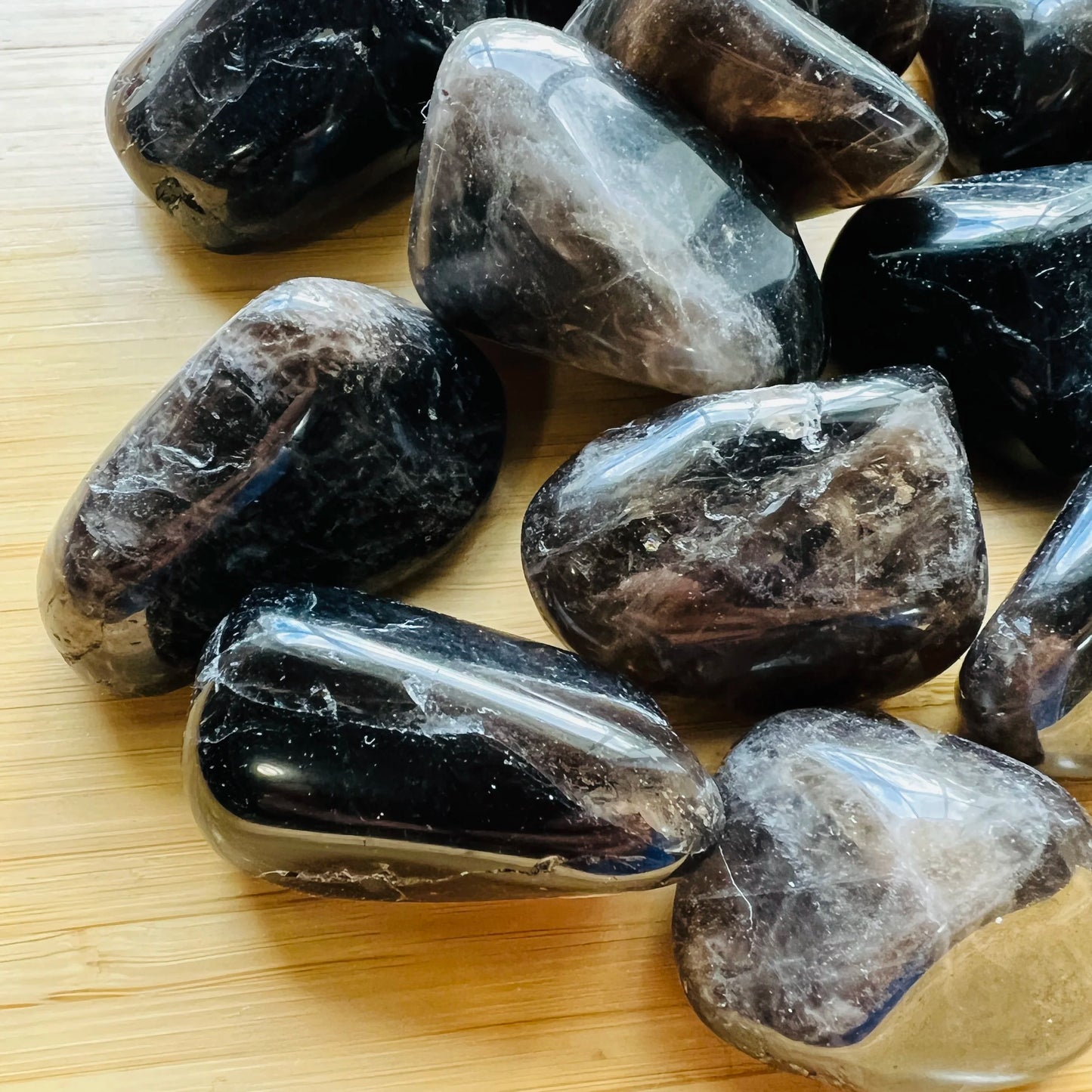 Side profile of Smoky Quartz tumbled stone, drawn on for Grounding.