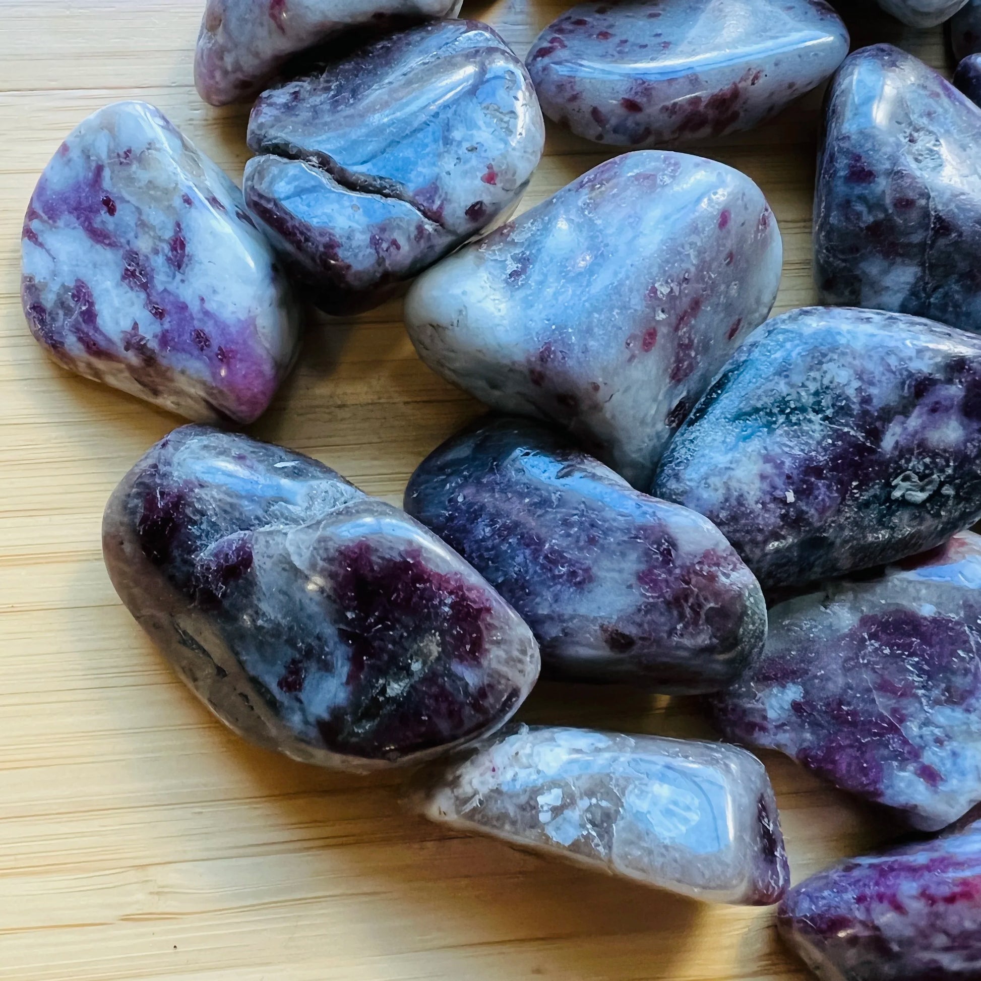 Looking down on Pink Tourmaline tumbled stone, sourced from Madagascar.