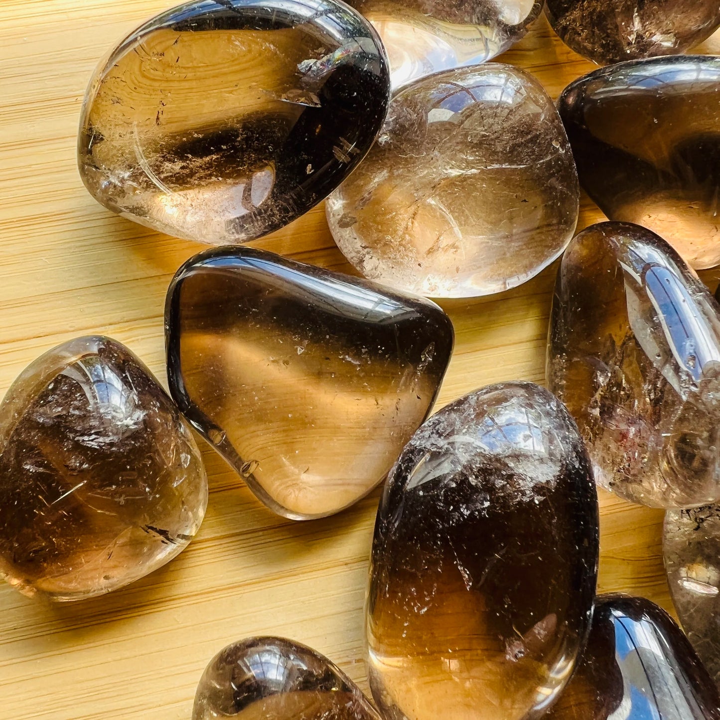 Side profile of brown Smoky Quartz tumbled stone, from Minas Gerais, Brazil.