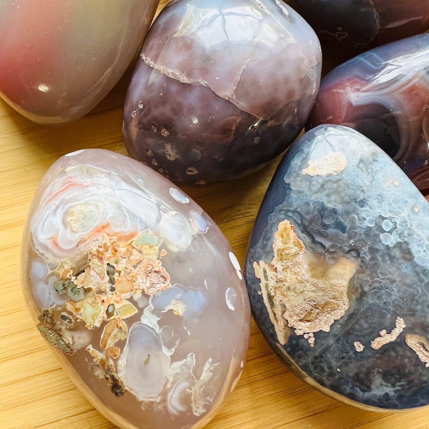 Side profile of Red Agate palm stone, to support Grounding.