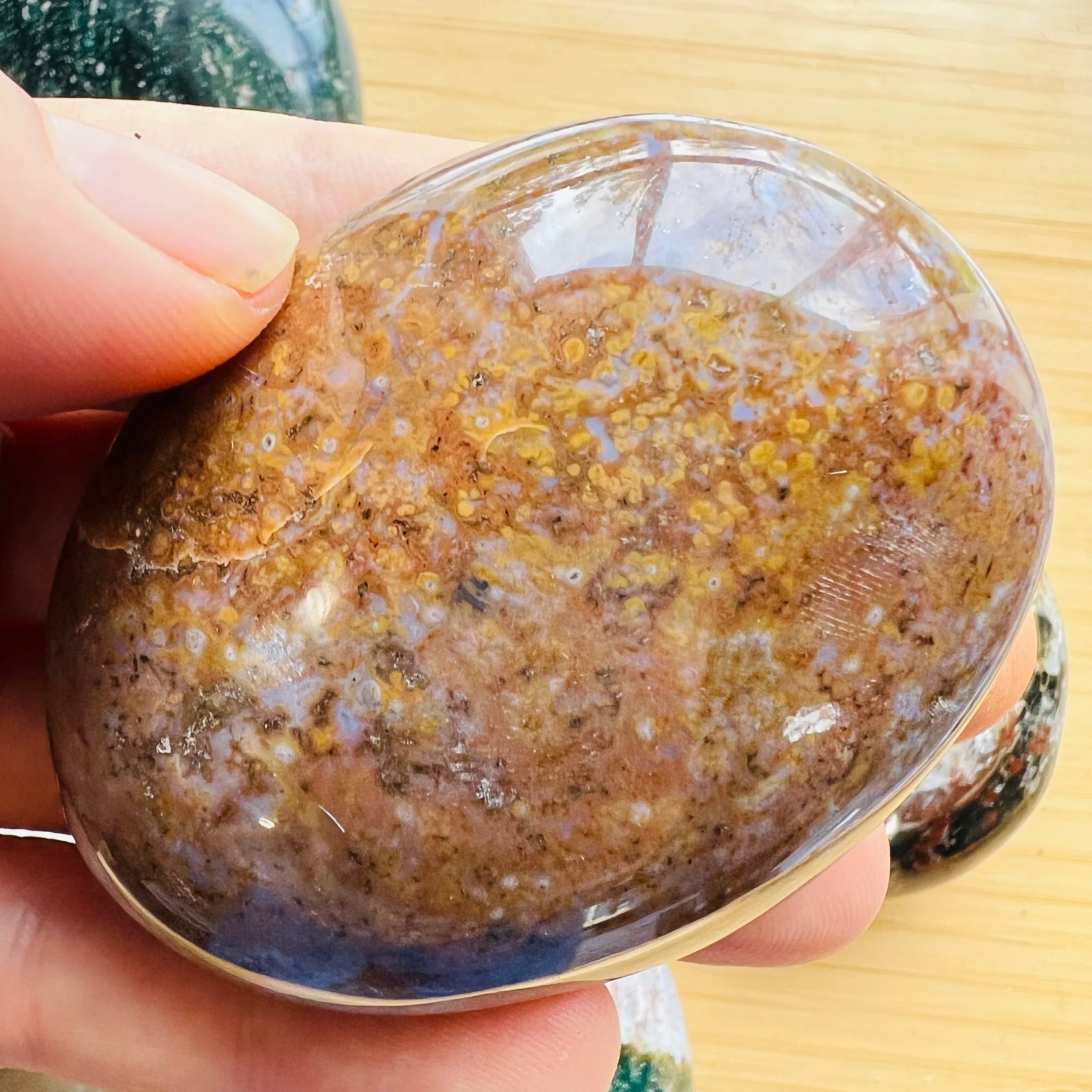 Full profile of Grade AA Ocean Jasper palm stone ready to ship from Beyond Bohemian